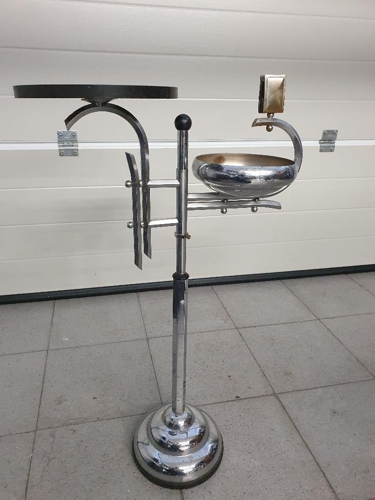 Designasbak antiek art deco, Ophalen