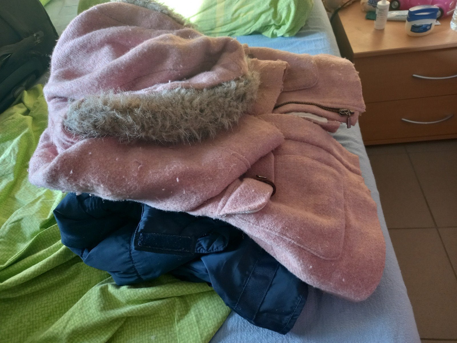 Winterjas mzisje maat 104, Ophalen