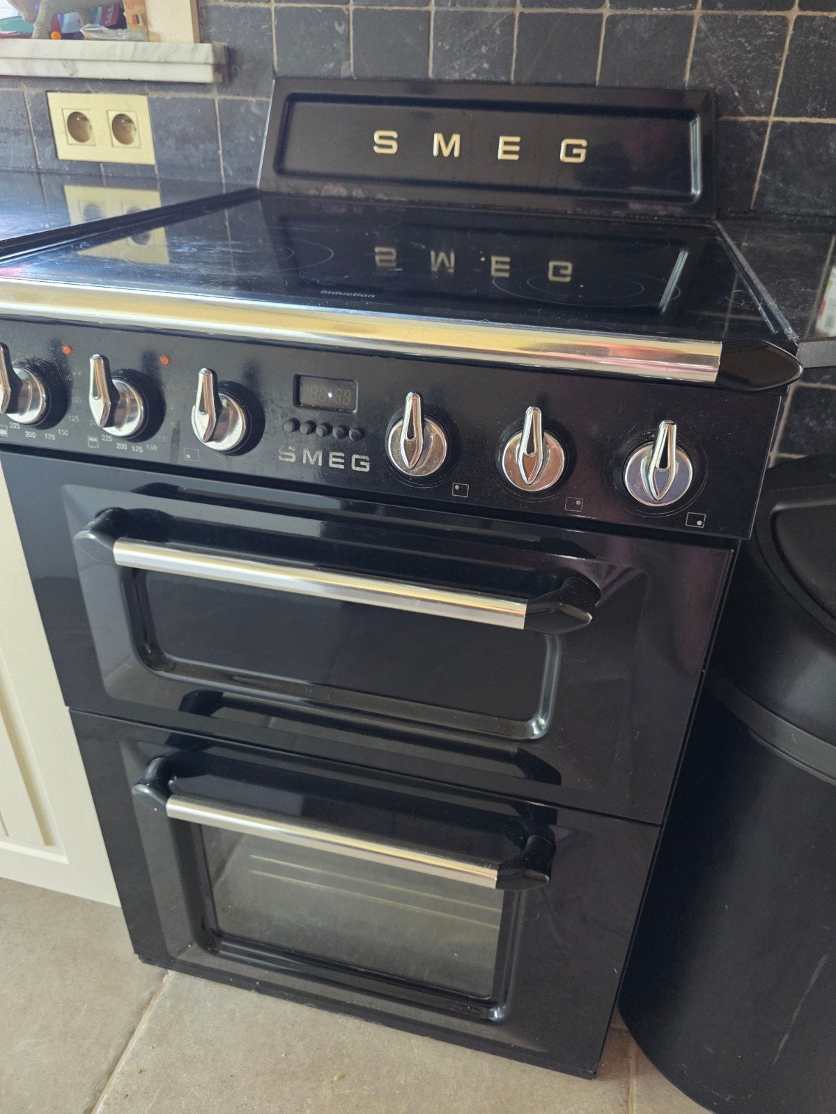 Smeg fornuis met dampkap, Ophalen