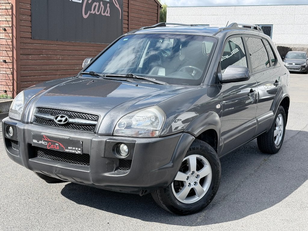 | Hyundai Tucson | Lichte Vracht | Automaat | Trekhaak |, Auto's, 1998 cc, Zwart, Bruin, Leder
