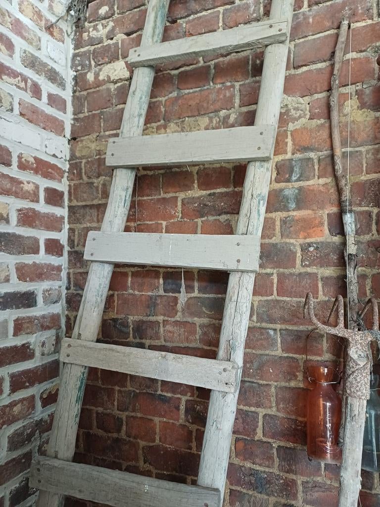 verweerde houten decoratieladder, Ophalen