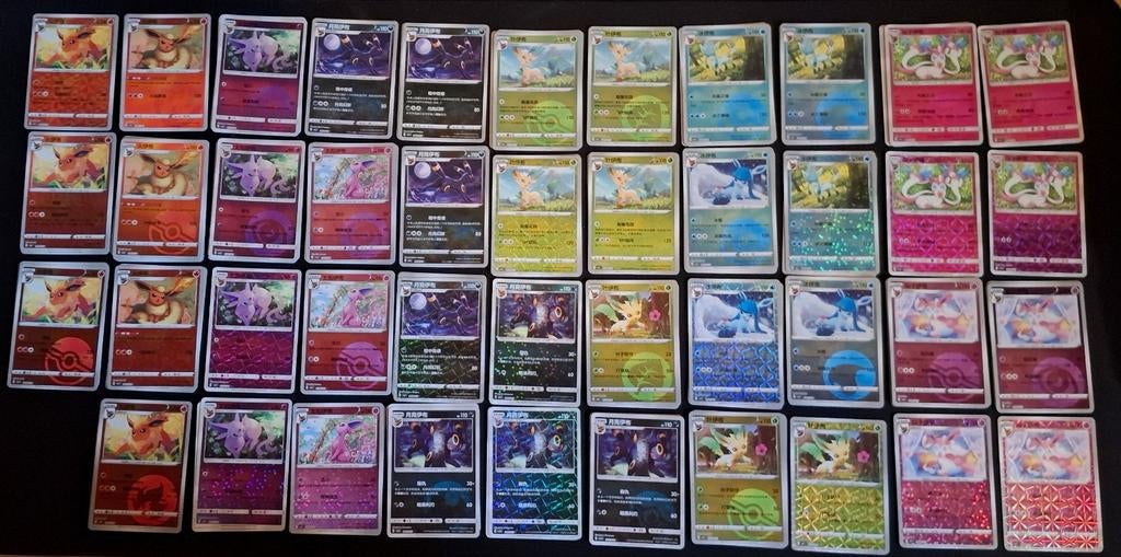 254 blinkende pokémonkaarten eevee en eeveelutions. Chinees., Ophalen of Verzenden, Zo goed als nieuw, Meerdere kaarten, Foil