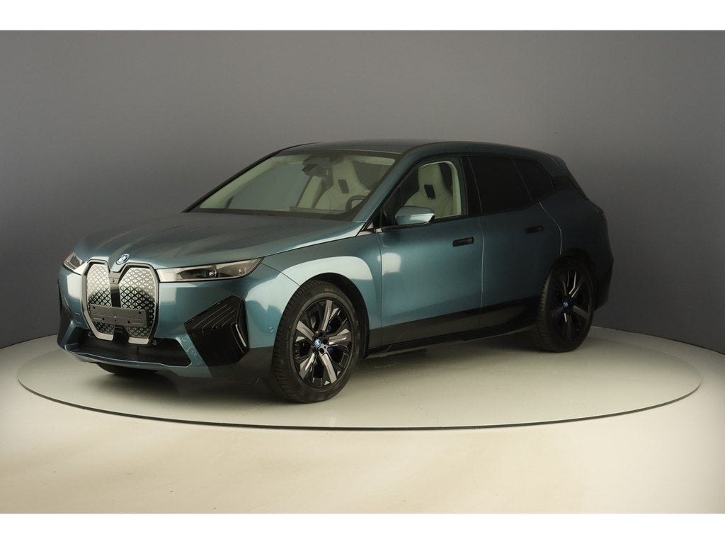 BMW iX xDrive40 326pk Pack Sport & Drive Assist, Auto's, BMW, Automaat, 241 kW, 326 pk, Blauw