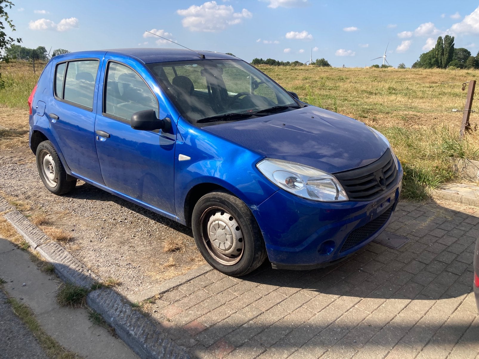 Dacia sandero 1.2i, Auto's, Dacia, Euro 5, Blauw, Handgeschakeld, Particulier