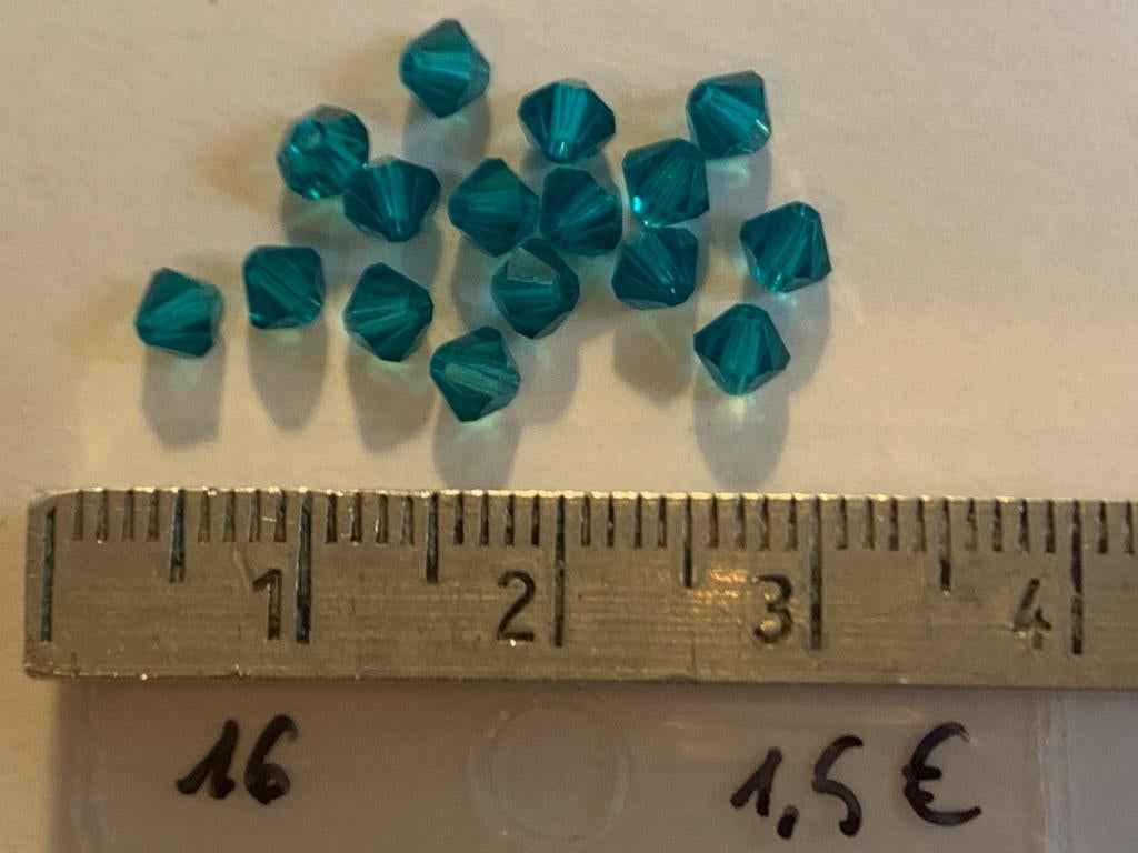 16 Swarovski tolletjes petrol, Ophalen of Verzenden, Nieuw, Kraal