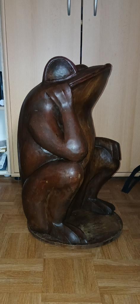 Handgeseden houten kikker, Ophalen