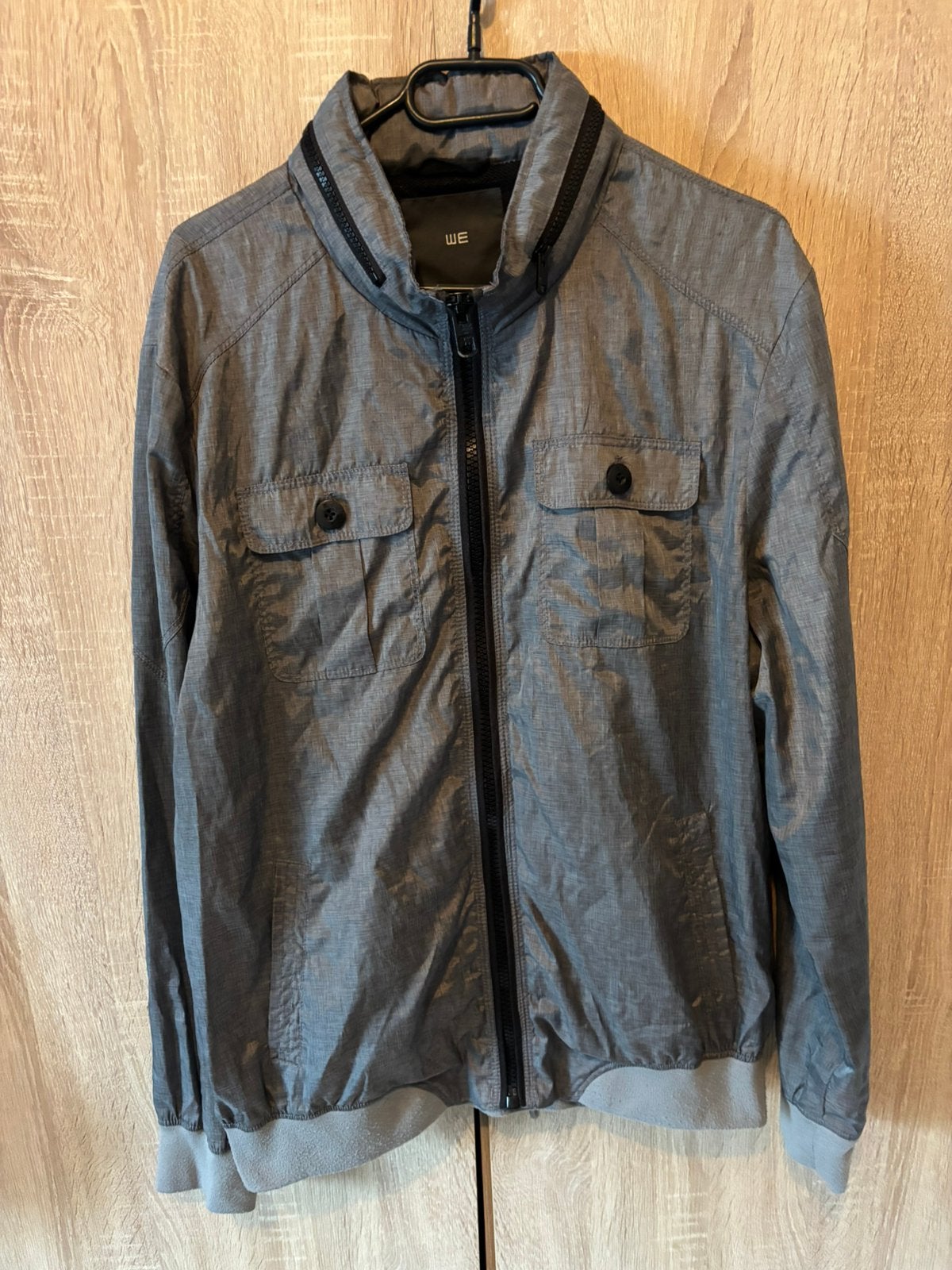 Jas we, Kleding | Heren, Jassen | Zomer, Ophalen of Verzenden, Zo goed als nieuw, Maat 56/58 (XL), Grijs
