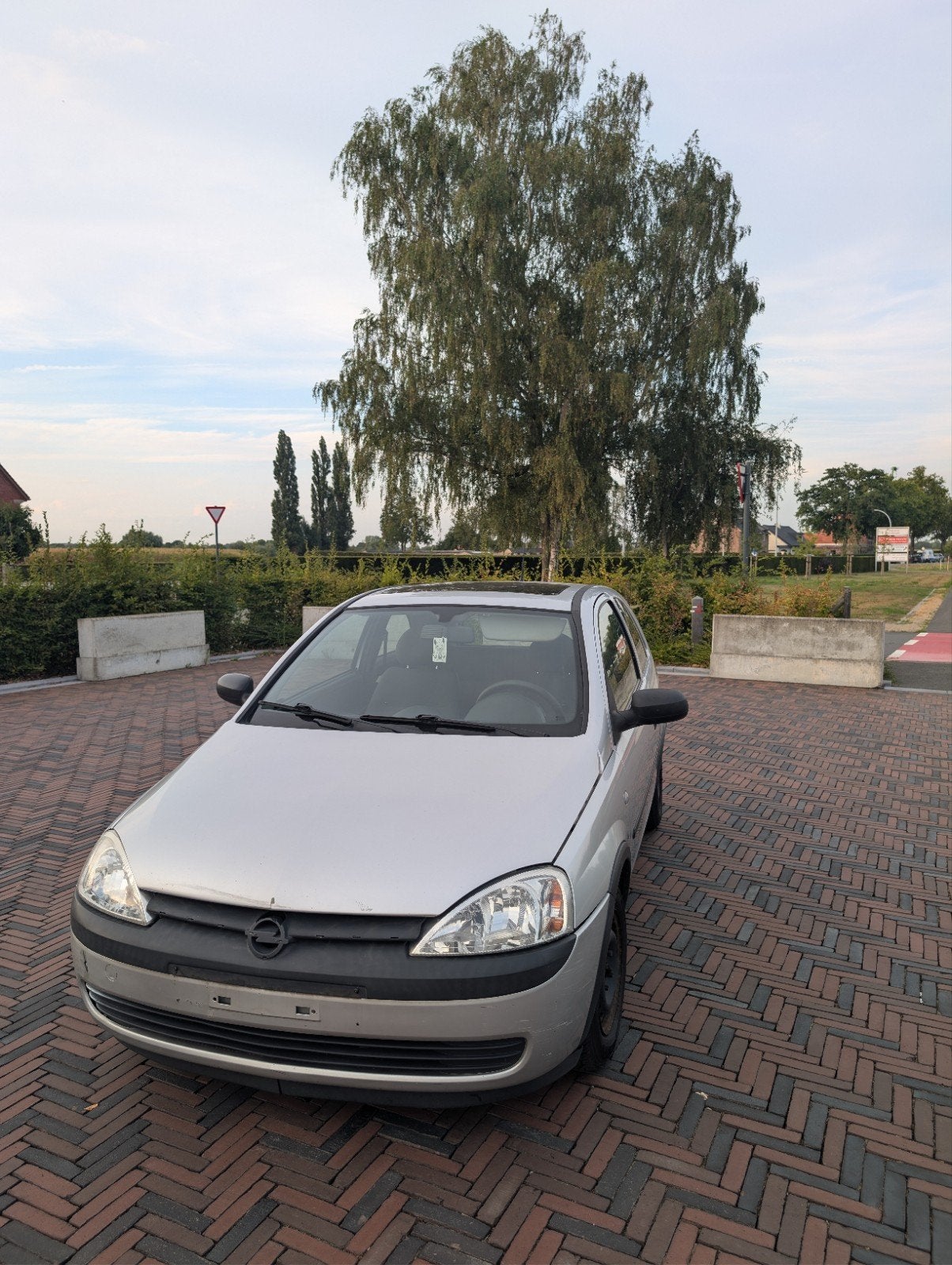 Te koop: Propere Opel Corsa 1.2 Benzine | Panoramadak | Geke, Autos, Opel, Argent ou Gris, Boîte manuelle, Noir, Particulier