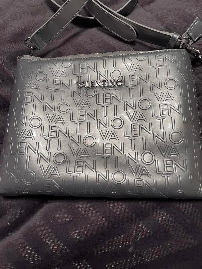 Valentino, Enlèvement ou Envoi, Comme neuf