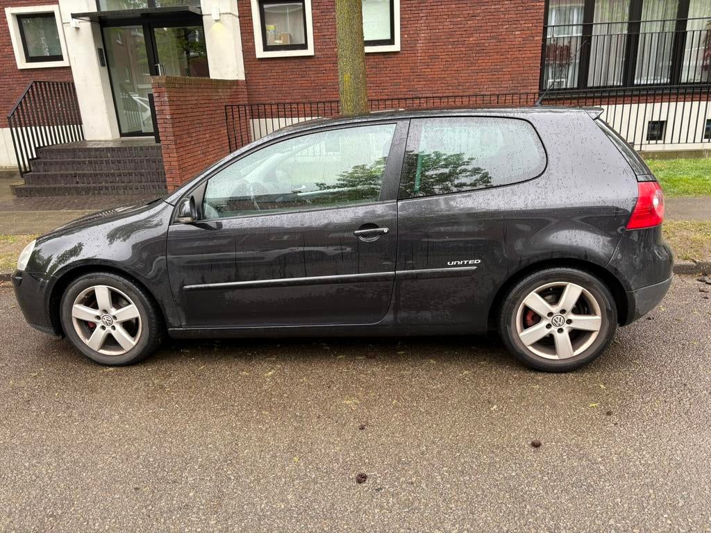 Volkswagen golf 5 united 1.4, Auto's, Zwart, Grijs, 59 kW, Overige carrosserie