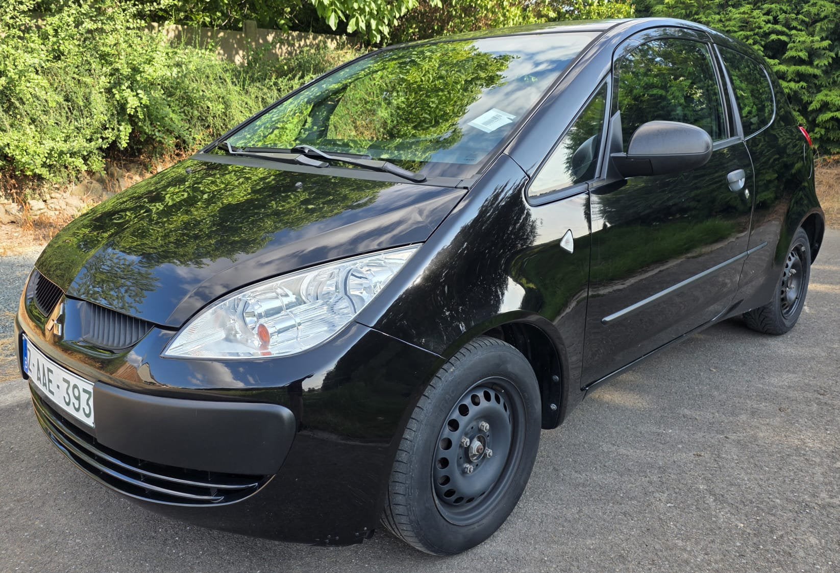 Mitsubishi Colt 1.1 benzine, Voorwielaandrijving, Zwart, Airbags, Bedrijf