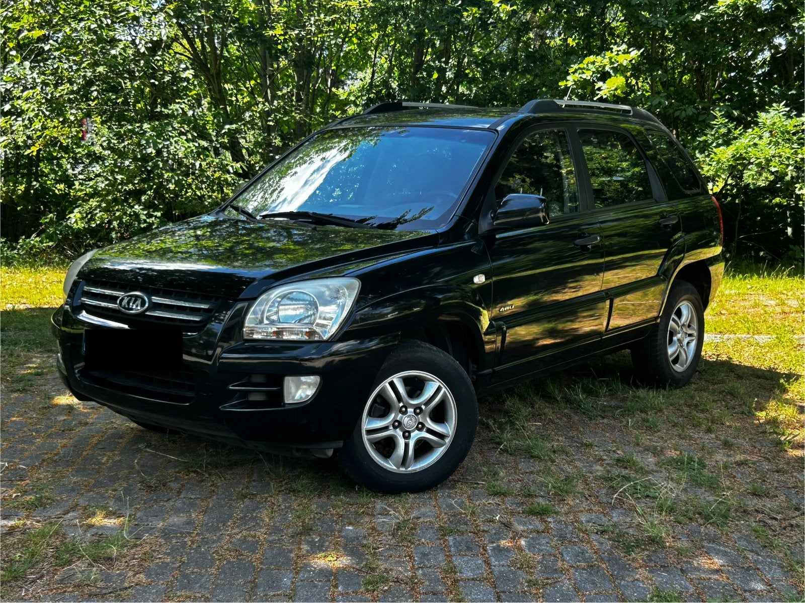 KIA Sportage - 2.0L DIESEL - AUTOMAAT - 4WD -  1e eigenaar, Automaat, 1998 cc, Zwart, Leder en Stof