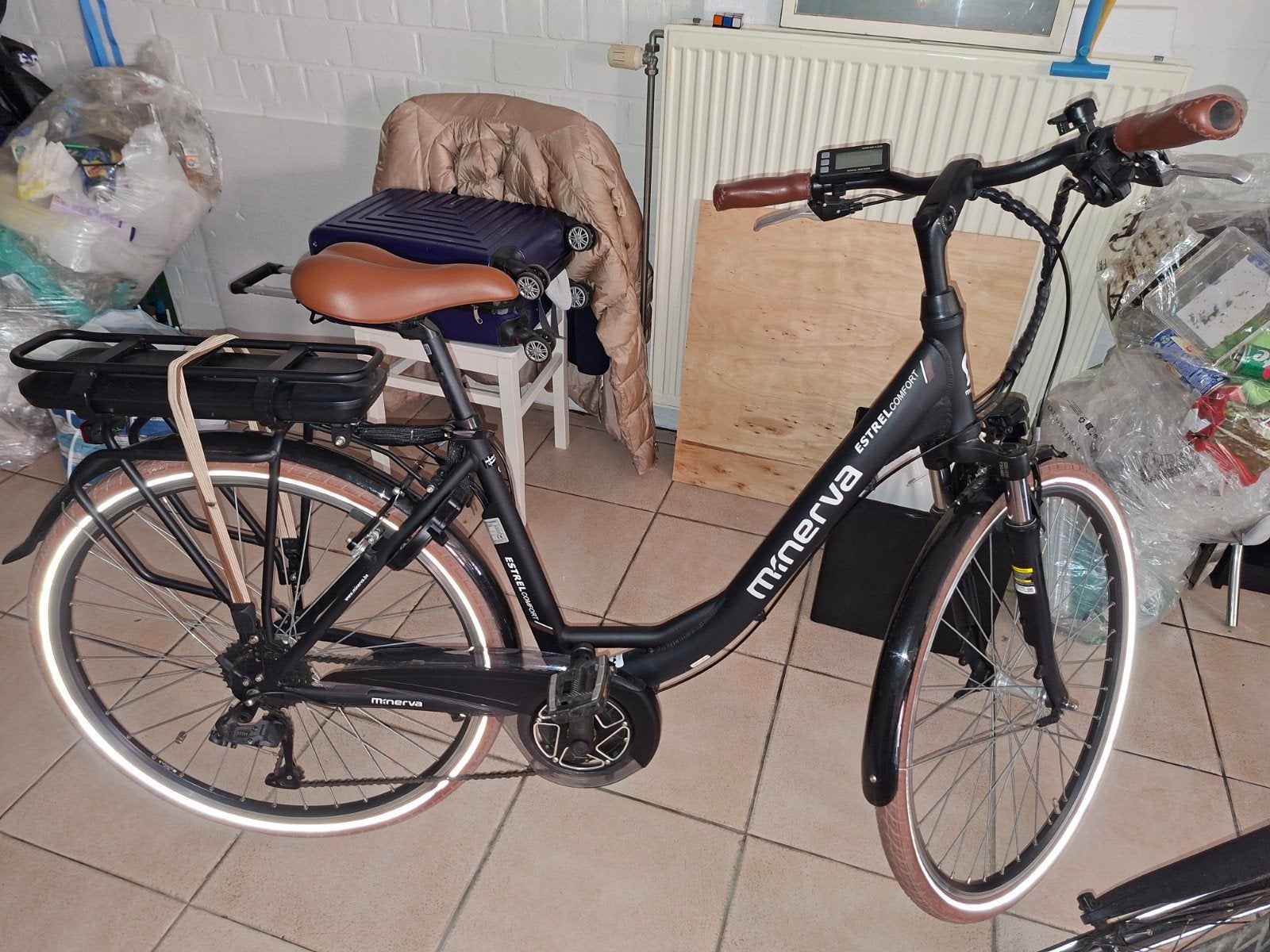 Elektrische damesfiets Minerva., Ophalen