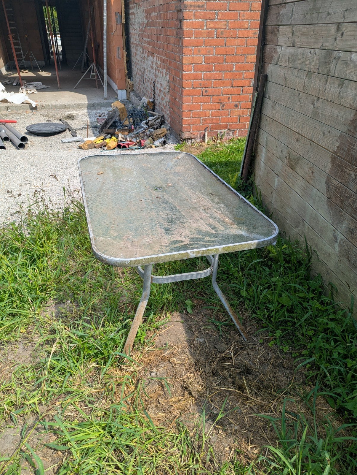 Glazen tuintafel, Ophalen