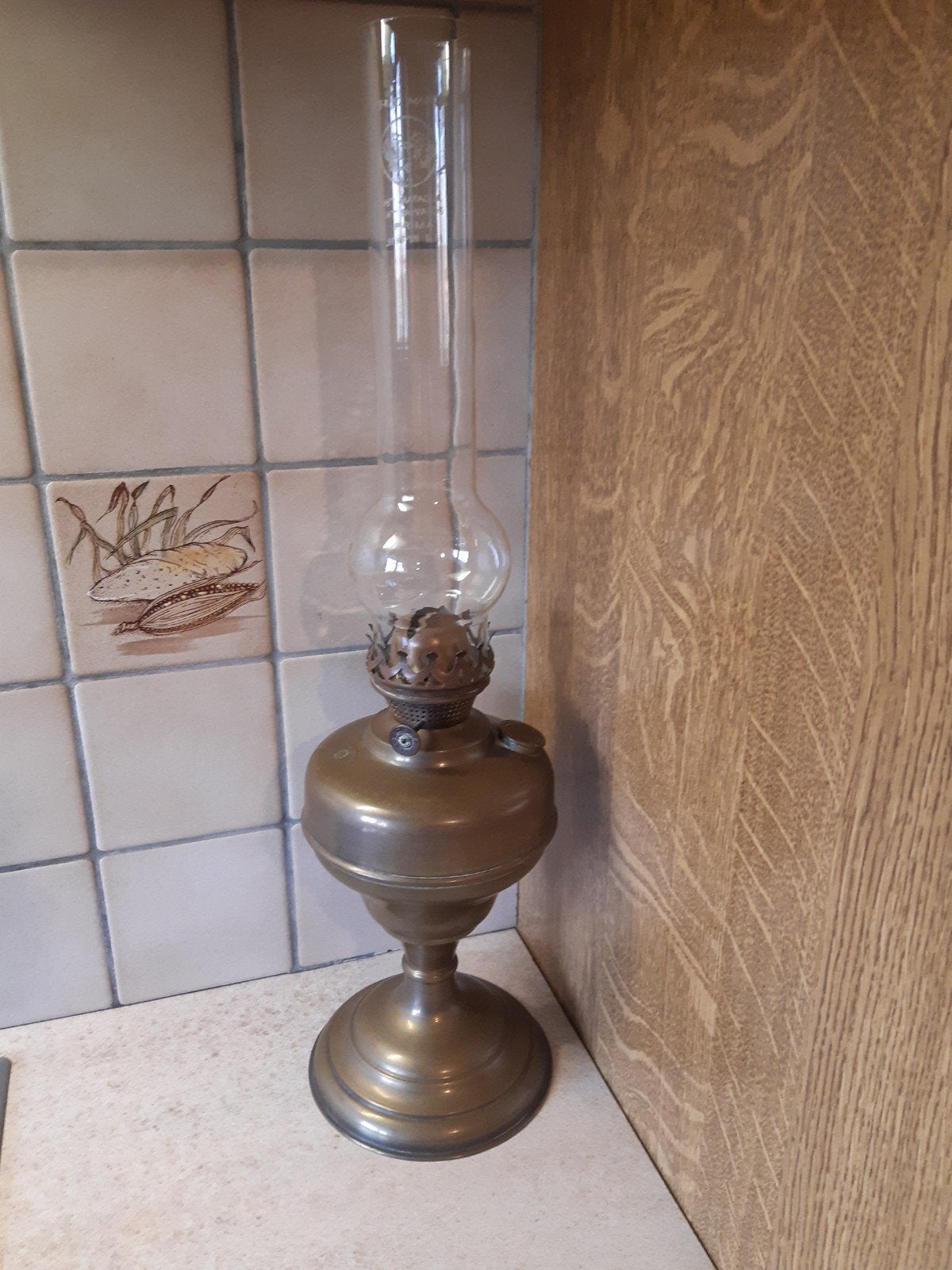 oude koperen petroleum lamp, Ophalen