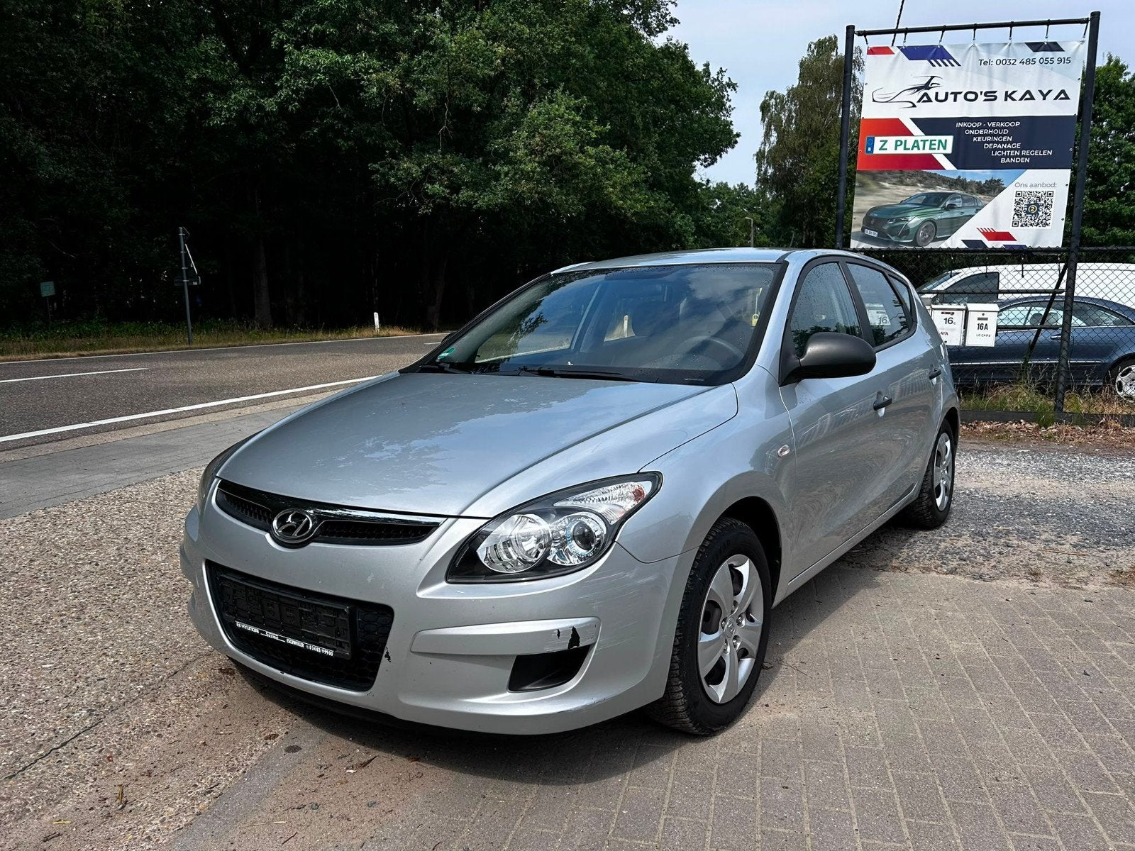 Hyundai i30 1.4 benziene 163000 km bij 2009, Auto's, Voorwielaandrijving, 4 deurs, Stof, Zwart