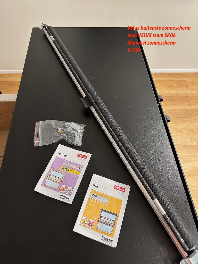 Velux Manueel zonnescherm voor SK06, Ophalen