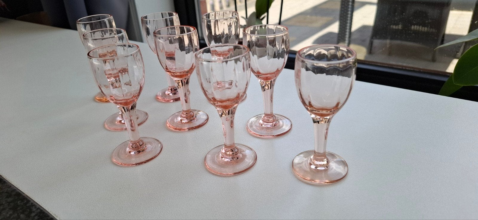 Negen rosaline aperitief of likeur glaasjes, Ophalen