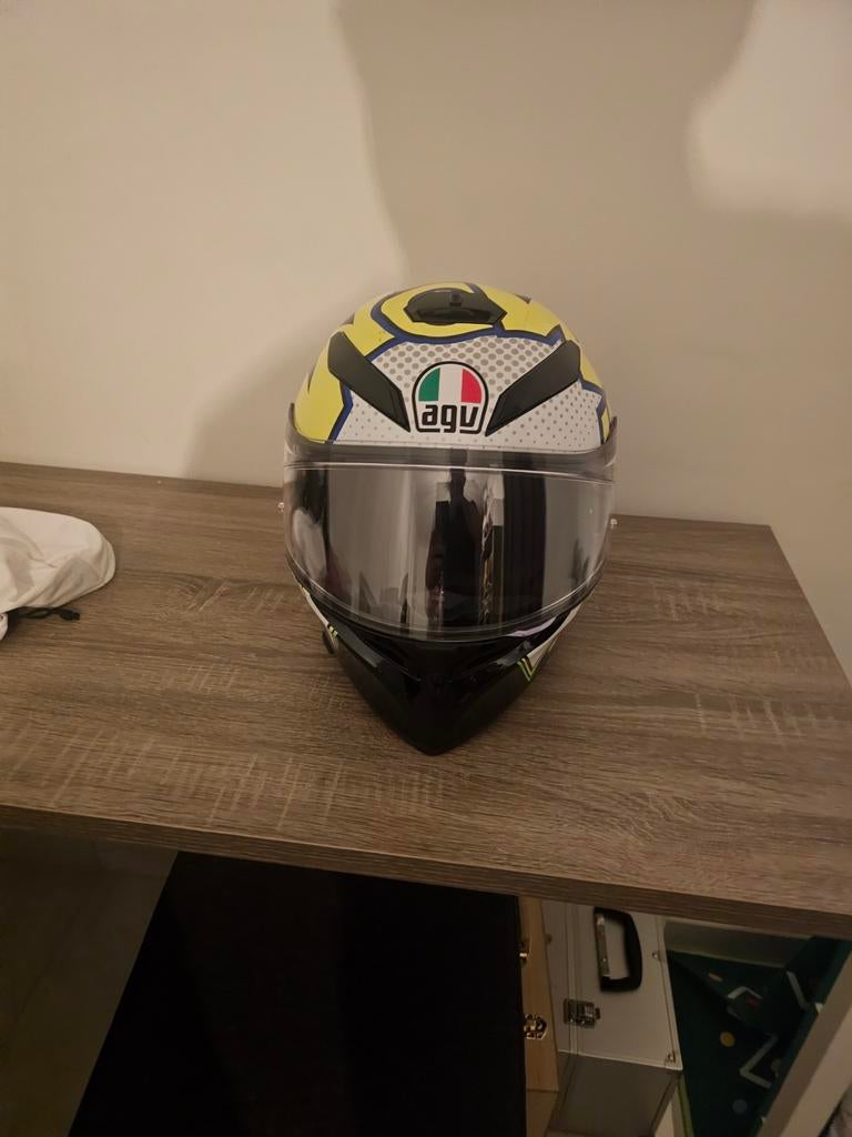 Motorhelm met zonne scherm, Ophalen