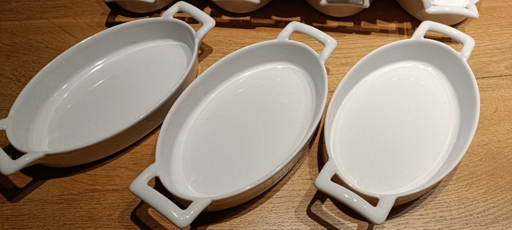 Lot 13 plats à four individuels ovales Revol, Neuf, Enlèvement ou Envoi, Récipient(s), Porcelaine
