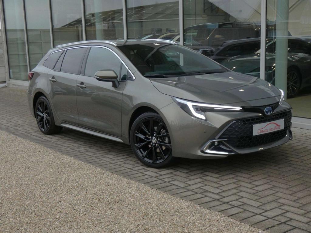 Toyota Corolla 1.8 Hybrid Premium 140pk +Head-up display +Sp, Auto's, 1300 kg, Gebruikt, 4 cilinders, Bruin