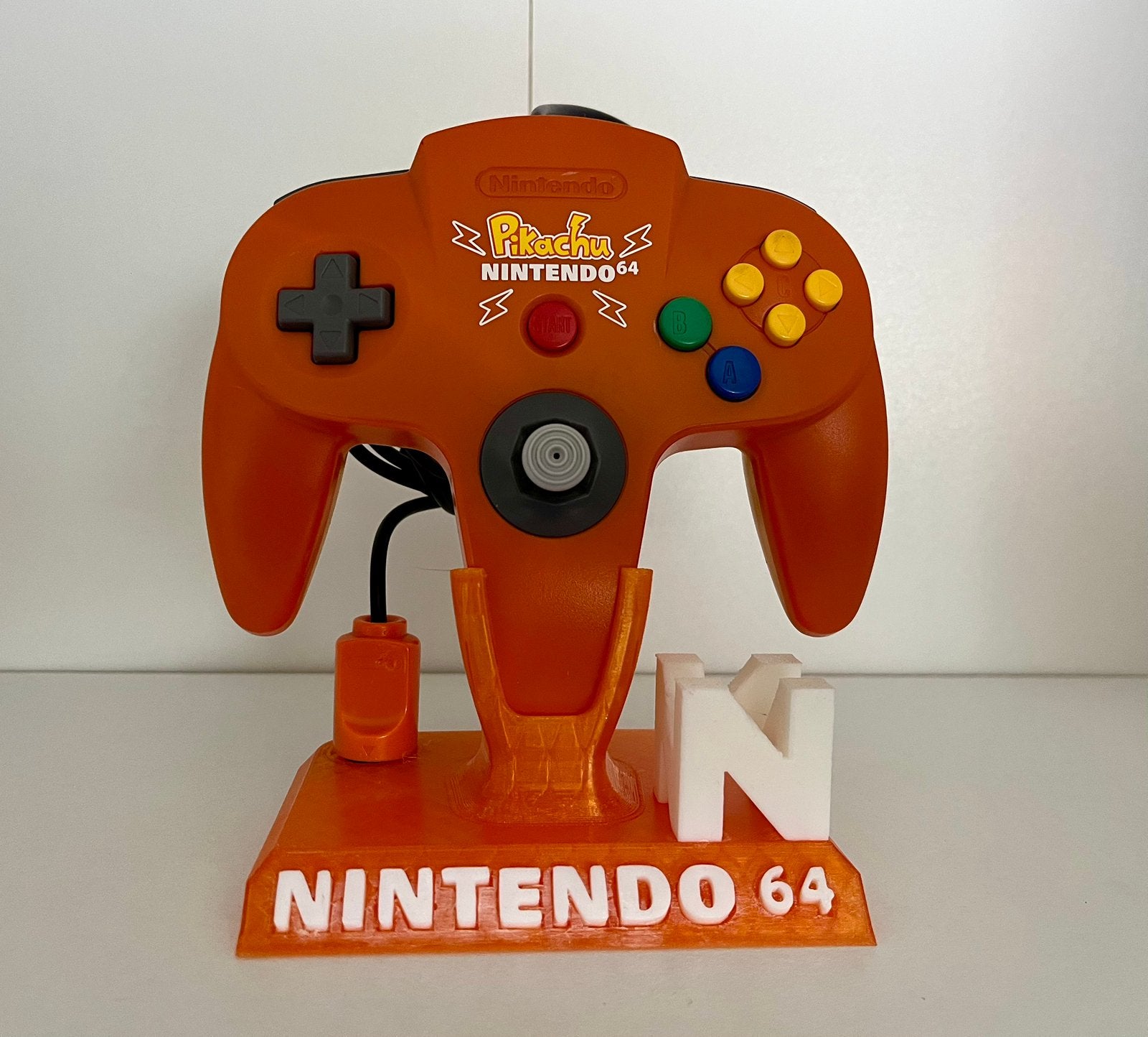 Controller Nintendo 64 Pokémon orange, Games en Spelcomputers, Spelcomputers | Nintendo 64, Ophalen, Zo goed als nieuw