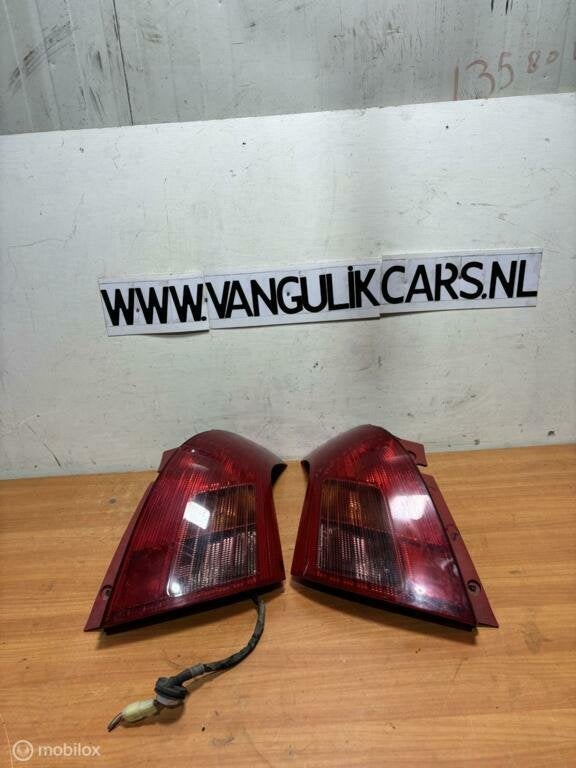 Achterlichten set origineel set Suzuki Swift III ('05-'10), Suzuki, Enlèvement ou Envoi, Utilisé, Suzuki