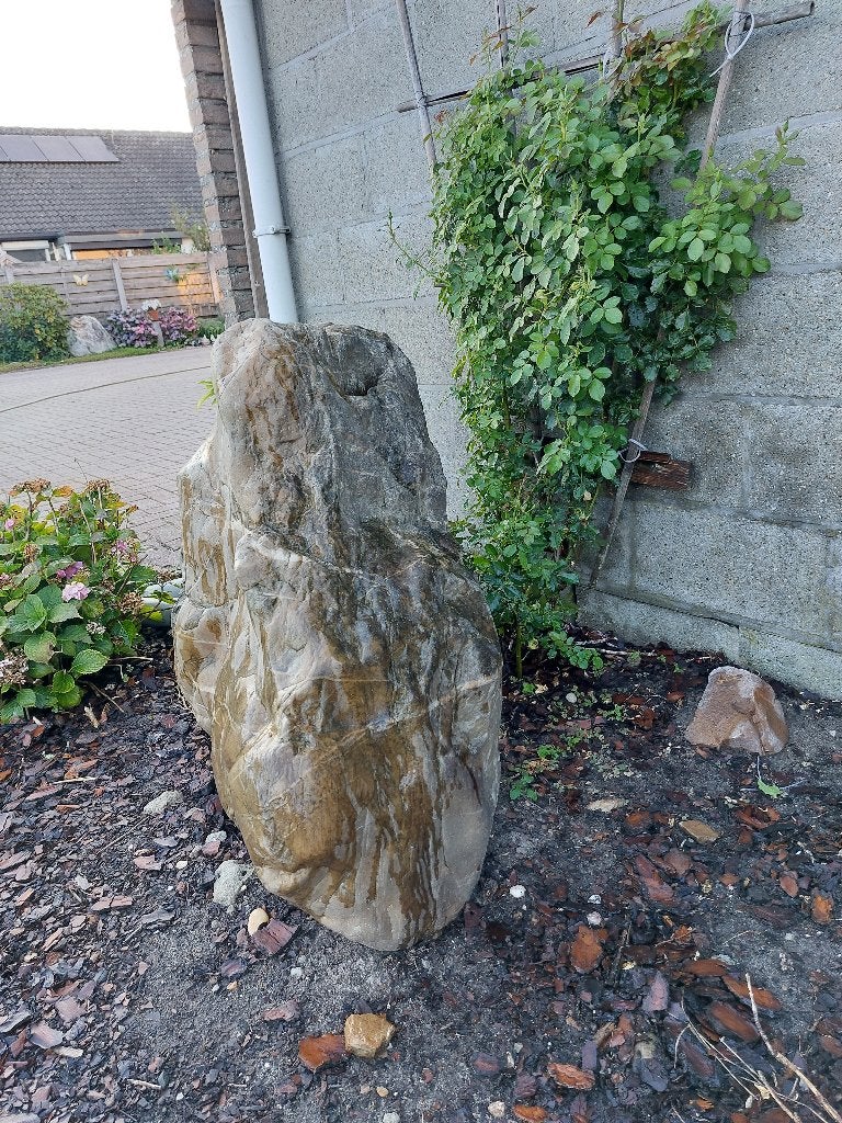 grote rotssteen voor tuin, Enlèvement