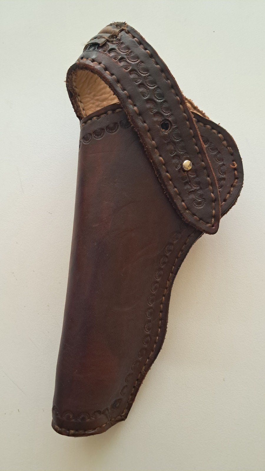 Holster wild west (echt leder), Ophalen