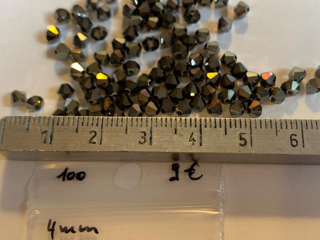 100 Swarovski tolletjes 4mm antraciet, Ophalen of Verzenden, Nieuw, Kraal