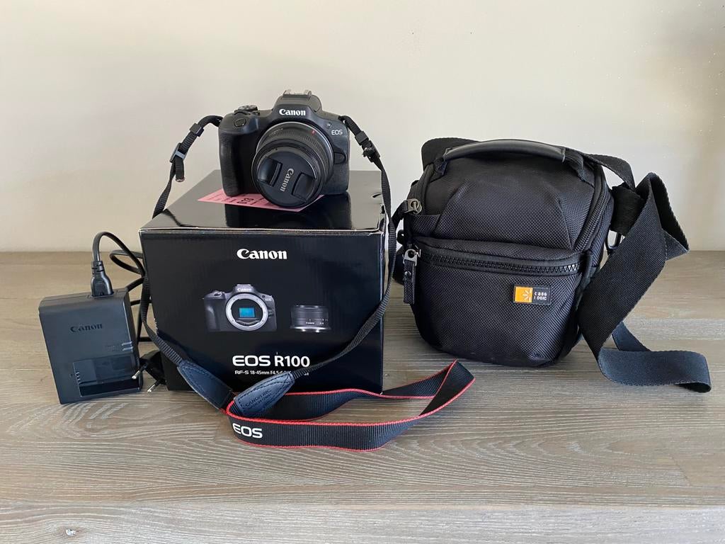 Appareil photo canon eos R100 18-45 + sac, Enlèvement, Comme neuf, Canon