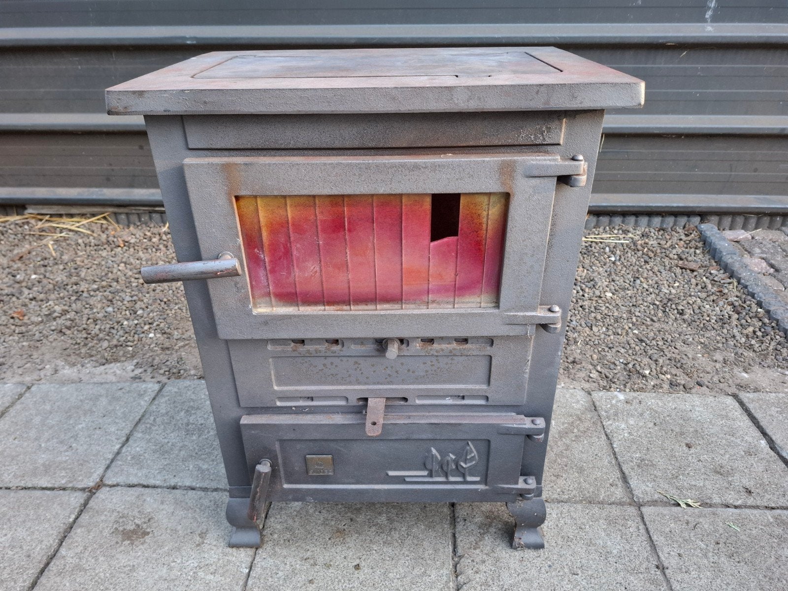 Kachel voor hout en steenkool, Ophalen