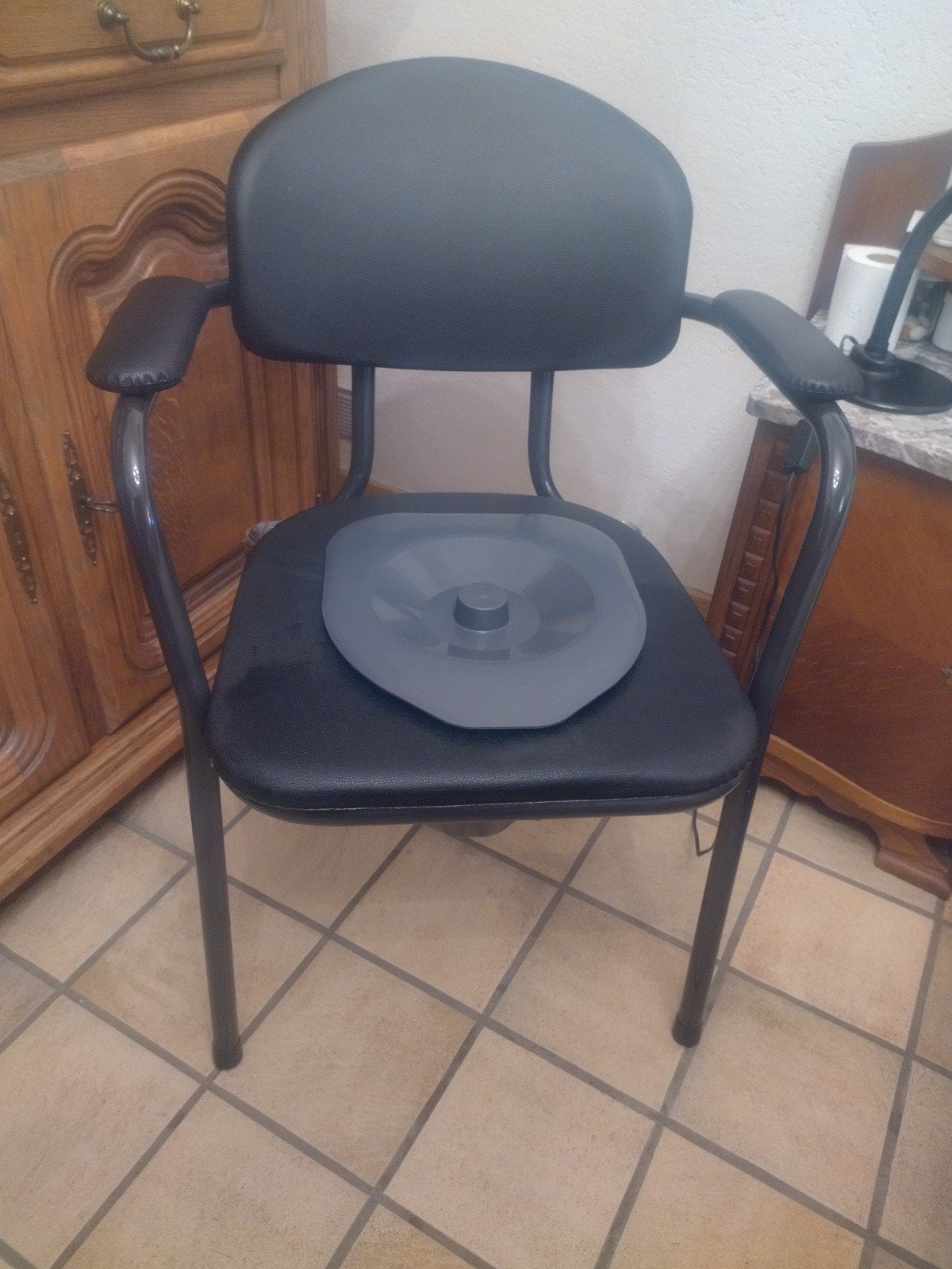 toiletstoel vermeiren, Ophalen