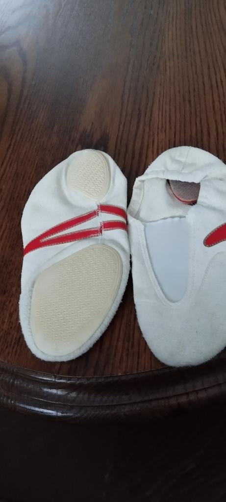 Pantoffels voor acrogym, Ophalen