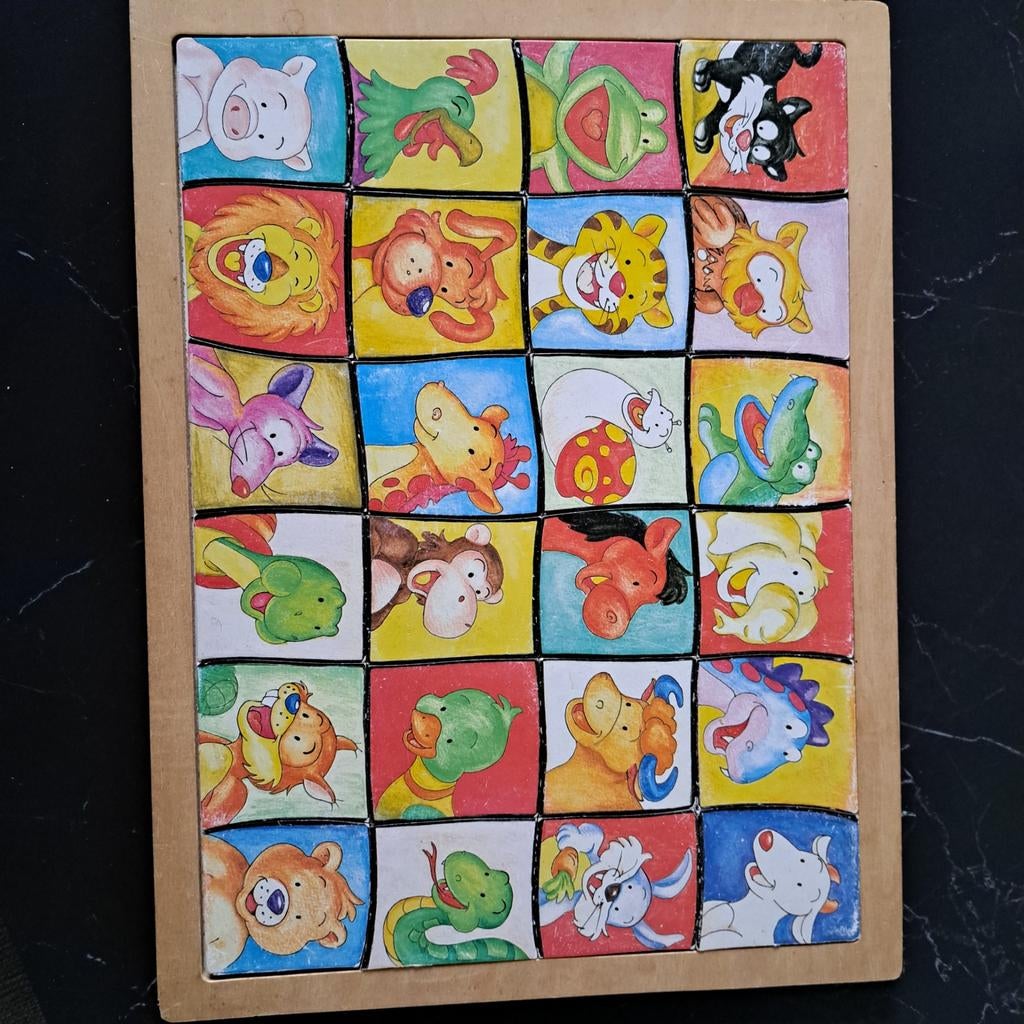 Houten puzzel met dieren, Ophalen
