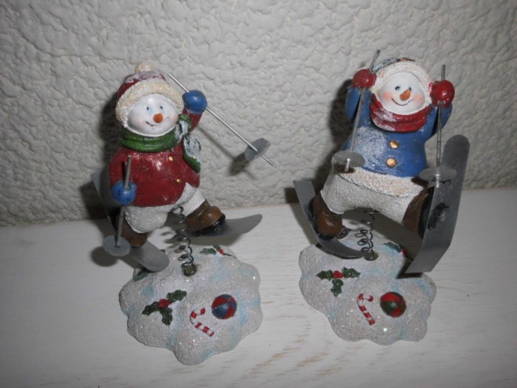 sneeuwman met ski's op veer, Ophalen of Verzenden