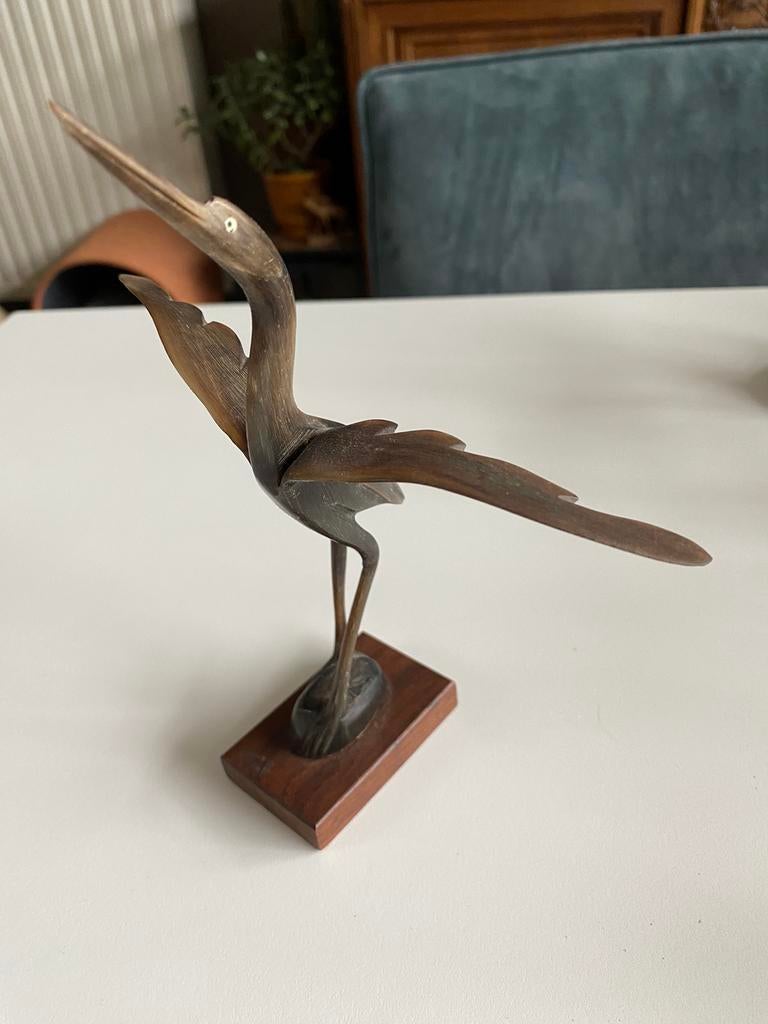 Mooie vogel uit hoorn, Ophalen