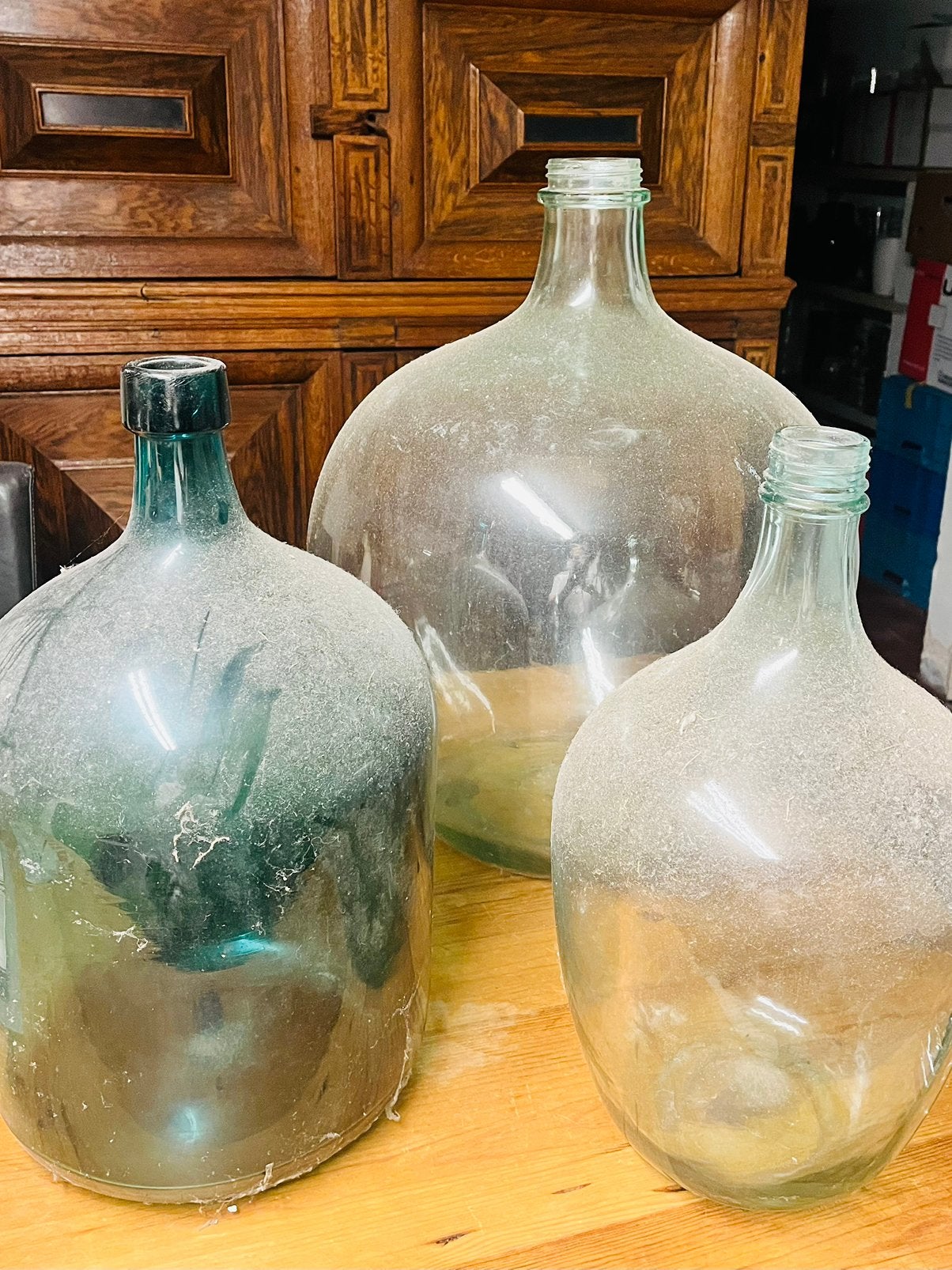 3 grote groene glazen flessen, Ophalen