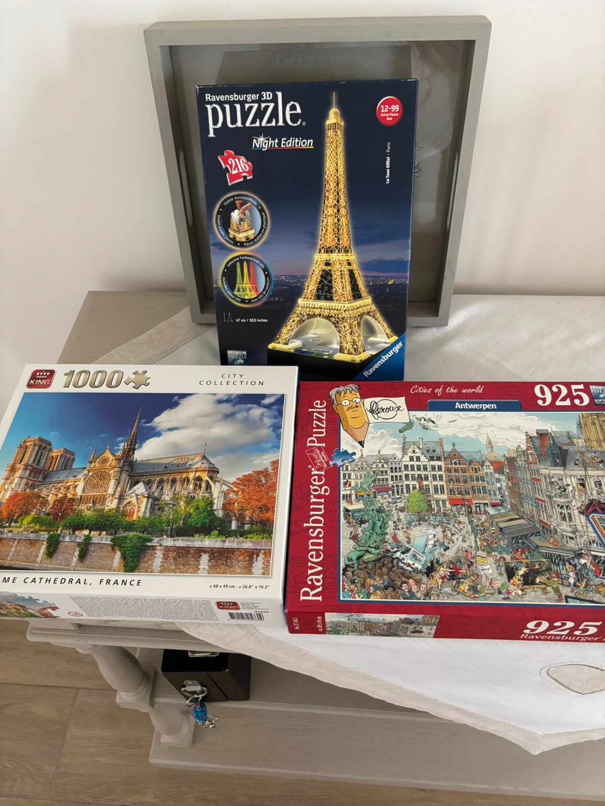 3 puzzels wo 2 Ravensburger Antwerpen en 1 3D eifeltoren, Ophalen, Zo goed als nieuw