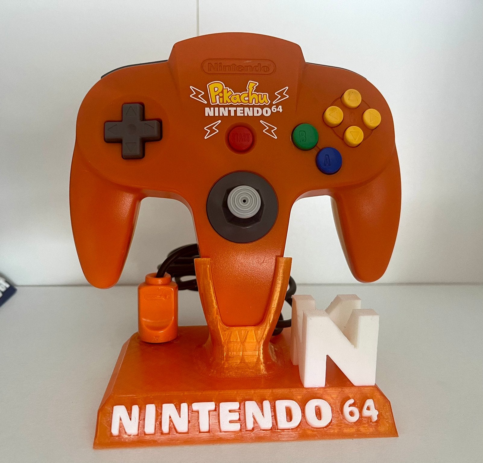 Controller Nintendo 64 Pokémon orange, Games en Spelcomputers, Ophalen, Zo goed als nieuw
