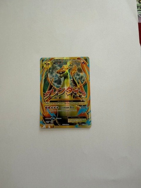 M charizard EX, Ophalen of Verzenden, Zo goed als nieuw, Losse kaart, Foil