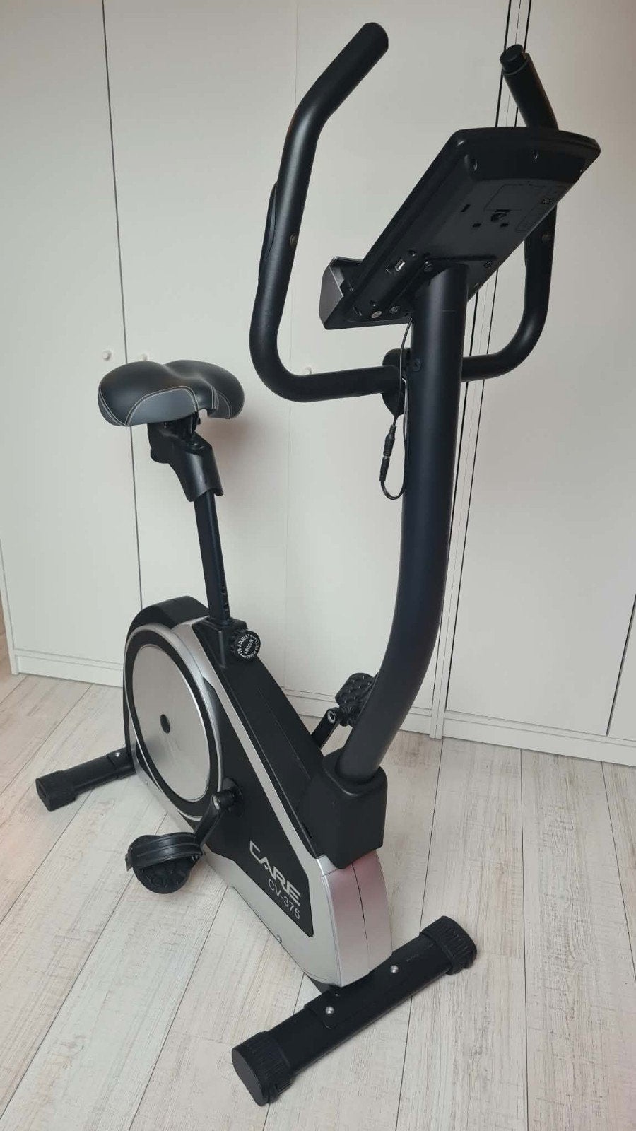 velo appartement CARE, Sports & Fitness, Enlèvement, Comme neuf, Jambes, Vélo d'appartement