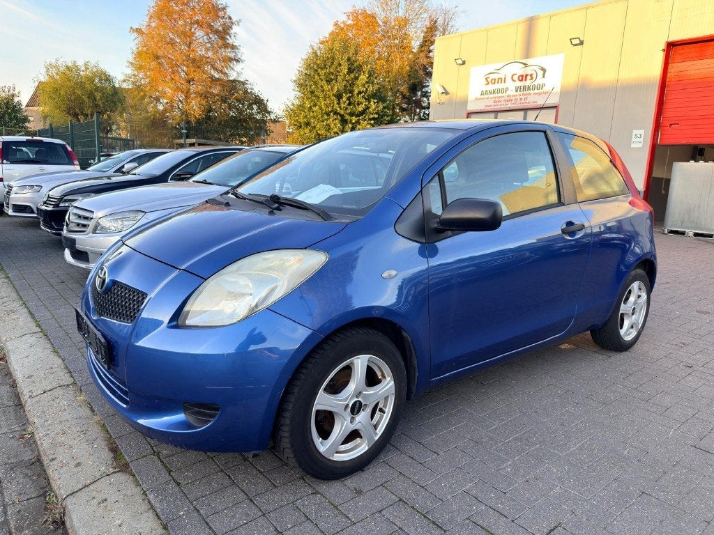 Toyota Yaris 1.3 benzine bouwjaar 2007 130000 km goede staat, Auto's, Stof, Zwart, 4 cilinders, Blauw
