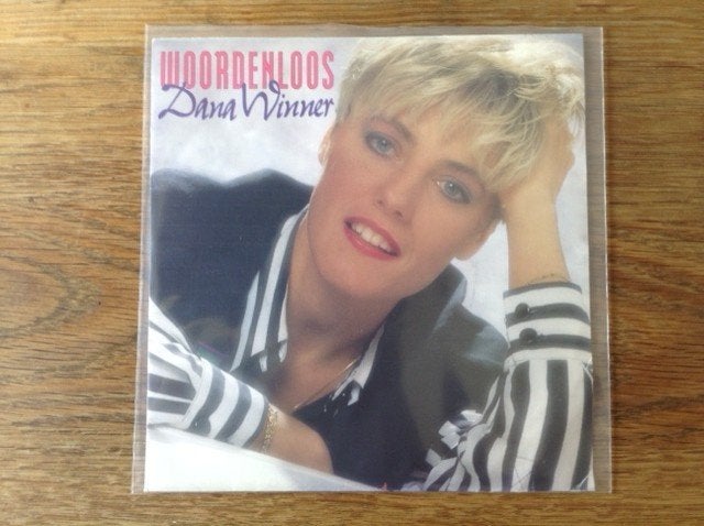 single dana winner, En néerlandais, Enlèvement ou Envoi, Housse de protection extérieure, 7 inch