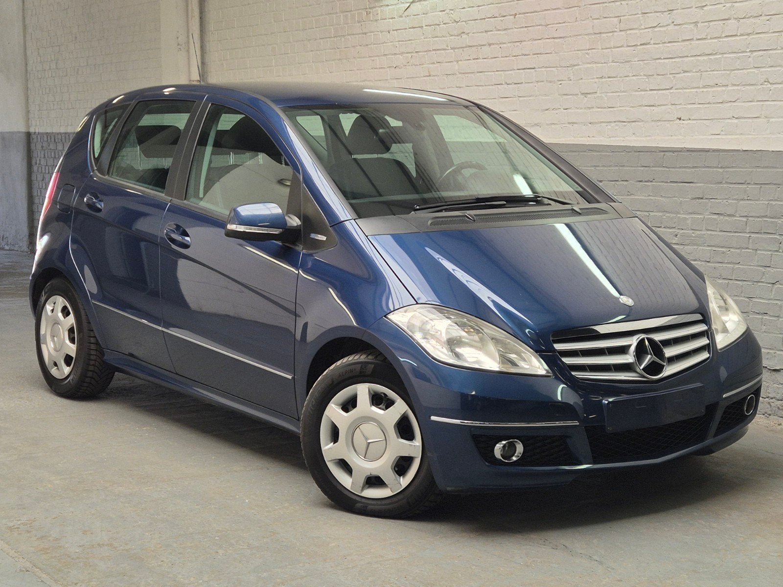 Mercedes A180 benzine Euro5 - Zeer mooie staat - Garantie, Monovolume, Zwart, 4 cilinders, Blauw