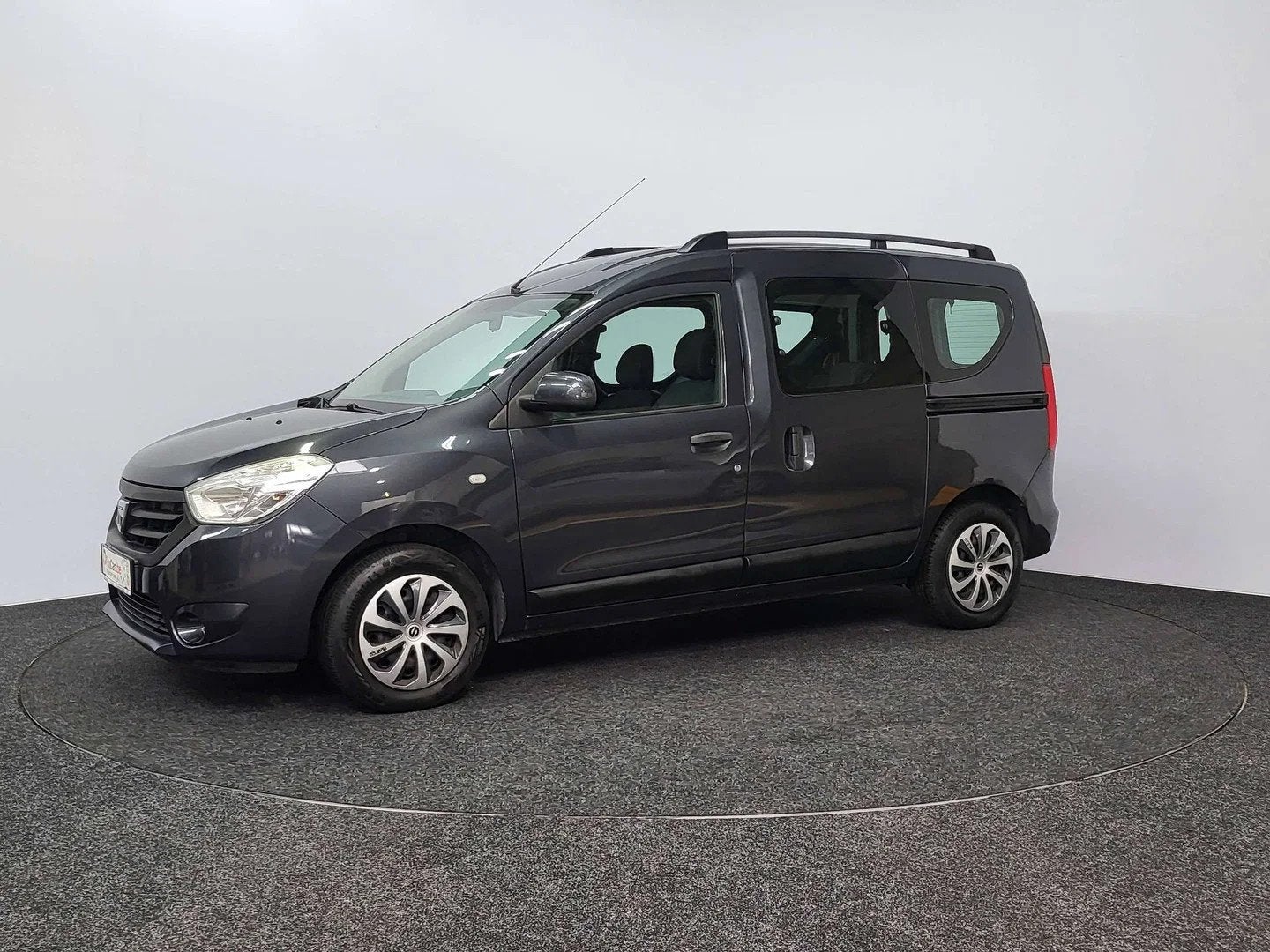 Dacia Dokker 1.6i Laureate | 2013 | 102.058 km | Airco | Rad, Auto's, Dacia, Euro 5, Stof, Gebruikt, Zwart