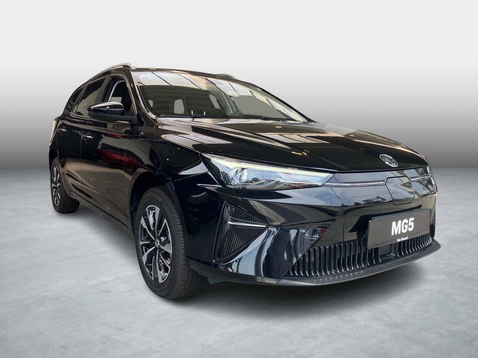 MG MG5 Comfort 61kWh, Auto's, MG, Stof, Zwart, https://public.car-pass.be/vhr/1cf7fa62-1c81-4829-b2d2-e986d8e70426, 156 pk
