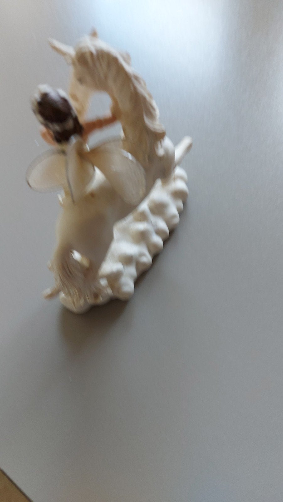 Fee met eenhoorn, Ophalen