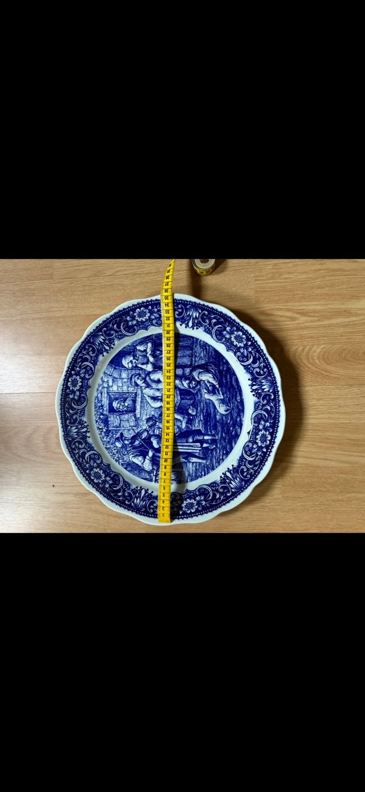 Delft wandbord, Ophalen