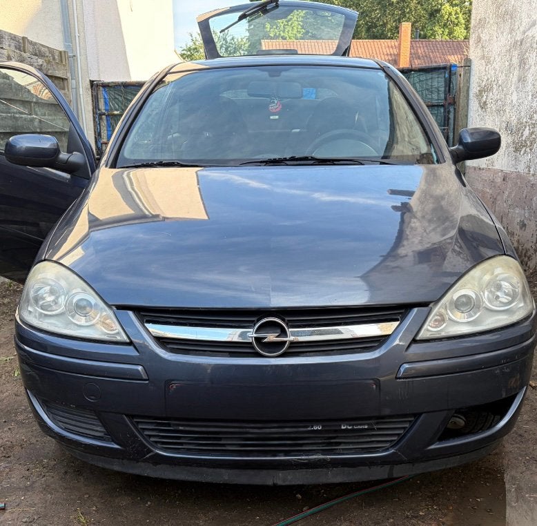 Opel corsa 1.2 twinport, Autos, Opel, Argent ou Gris, Achat, Boîte manuelle, Noir